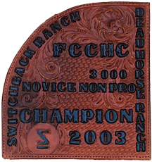 a hand-tooled leather award plaque made by The Brown Cow Saddle Blanket Company